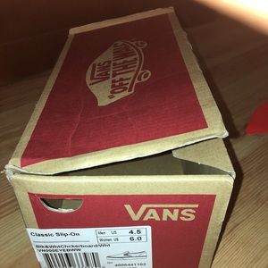 Vans. Checkerboard slip ons